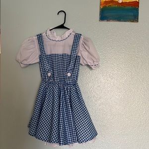 Child’s Dorthy costume from “wizard of Oz”